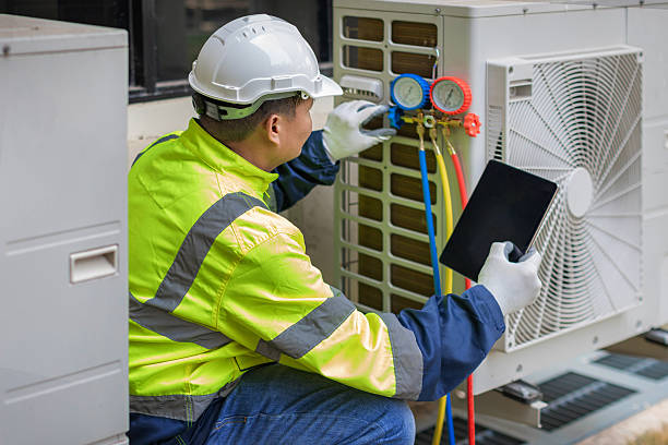 Professional Air Conditioning Repair technician working in Highland Park, NJ